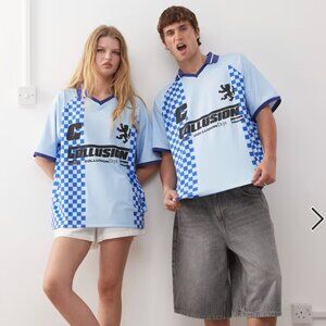 COLLUSION Unisex soccer top